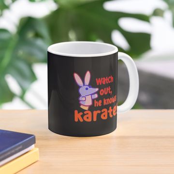 Discover Watch out,he knows karate Coffee Mug