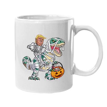 Discover Donal Trump Riding Mummy Dinosaur T-rex Halloween Coffee Mug