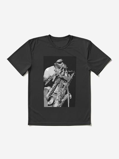 Rahsaan Roland Kirk. Ronald Theodore Kirk. Roland Kirk. an American jazz multi-instrumentalist who played tenor saxophone, flute, and many other instruments. | Active T-Shirt