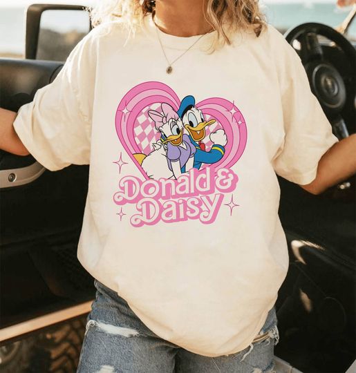 Donald And Daisy Duck Pink Doll Heart Shirt | Donald Duck Couple Shirt | Donald And Daisy Pink Valentines Shirt Disneyland Valentine Shirt
