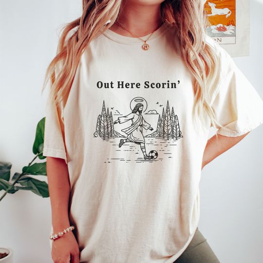 Out Here Scorin - Funny Jesus Playing Soccer Shirt - Unisex Cotton Graphic T-shirt