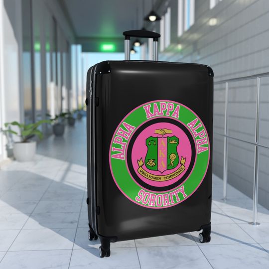 Cute Alpha Kappa Sorority Suitcase - AKA Pink and Green Traveling Soror Luggage with Greek Letters and Round Design.