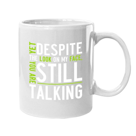 Yet Despite The Look On My Face, You're Still Talking | Sarcastic Coffee Mug