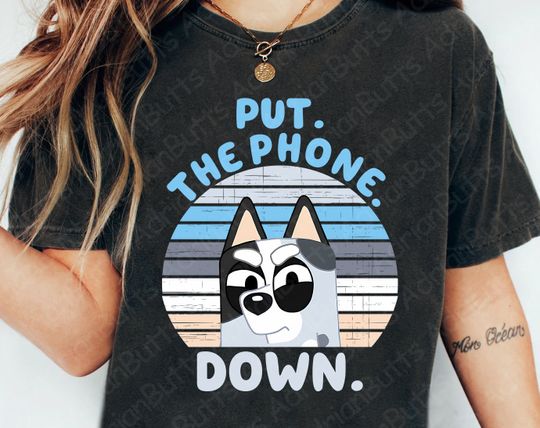Discover Put The Phone Down T-Shirt, Movies Characters, BlueyDad Fan T-shirt