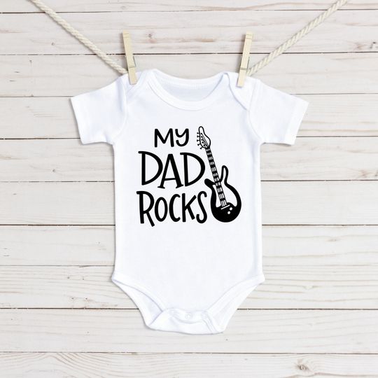 Discover My Dad Rocks Baby Onesie