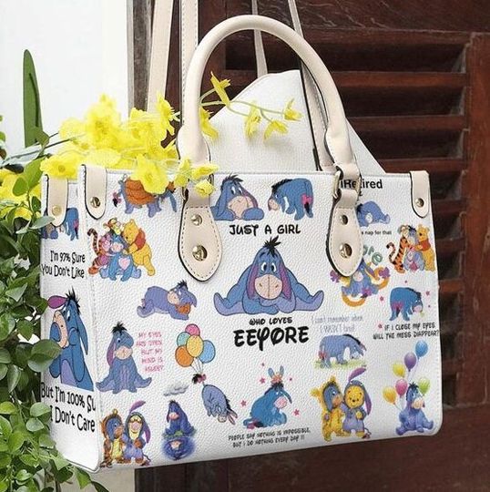 Discover Winnie The Pooh Eeyore Women leather hand bag