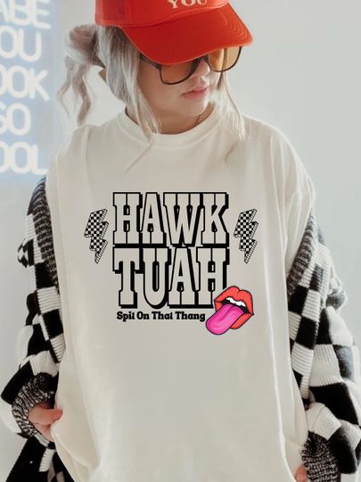 Hawk Tuah, Spit On That Thang Viral Funny Shirt, Trendy Dark Humor  Unisex short sleeves heavy cotton shirt