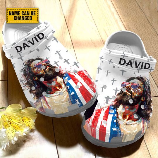 Teesdily Customized Jesus Cross American Flag Clogs Shoes, Cool Jesus Clogs For Dad, Happy Independence Day, Christian Kid & Adult Eva Clogs