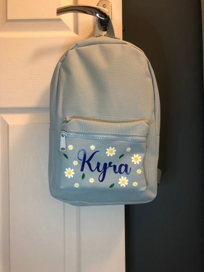 Personalised - daisies children's school backpack. Navy, blue, pink, lilac / purple or pistachio / green colours available