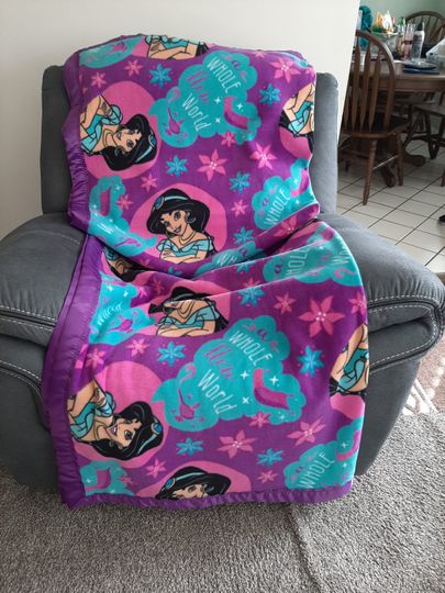 Discover Disney Jasmine, Teen Fleece Blanket with matching purple satin trim