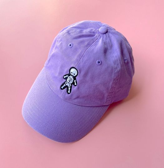 Discover SKELETON HAT - Spooky Doodle Club Lilac Embroidered Dad Hat Baseball Cap