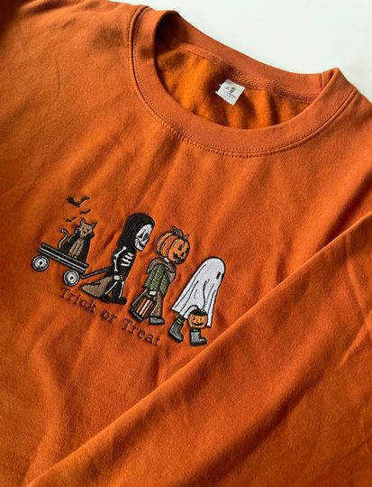 Discover Embroidered 'Trick or Treat' Sweatshirt