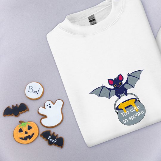 Discover Organic sweatshirt embroidered with a Halloween crewneck of a bat too cute to scare