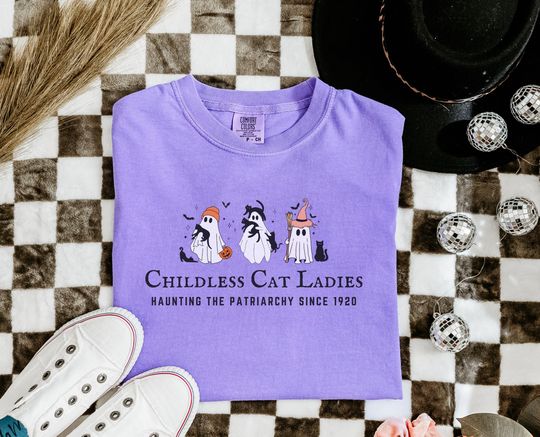 Discover Halloween Childless Cat lady comfort colors shirt, cute ghosts for kamala harris, the patriarchy feminism shirt, spooky election shirt 2024