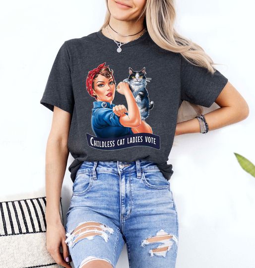 Discover Childless Cat Ladies Vote Rosie The Riveter T-Shirt, Childless Cat Ladies Shirt, Against Fascism Tee, Feminist Voting Shirt, Election 2024