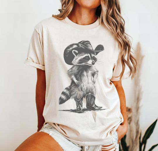 Discover Western Raccoon Shirt, Vintage Cowboy Racoon Graphic Tee, Cute Oversized Comfort Colors Tshirt, Funny Raccoon Meme T-Shirt