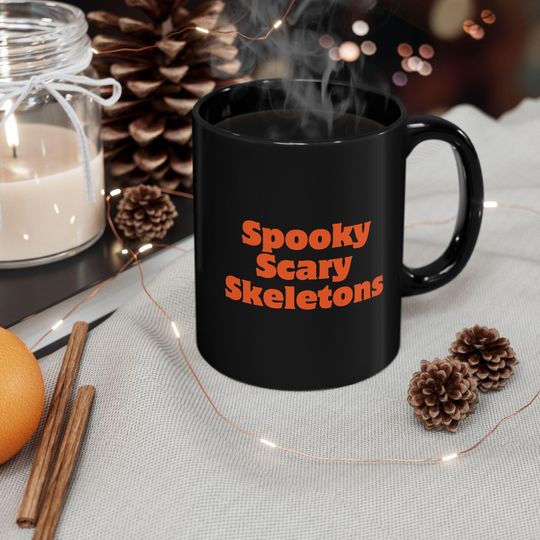Spooky Scary Skeletons black ceramic mug, vintage cozy, spooky vibes fall gift, horror mug, neon orange, disney vibes cute spooky black mug