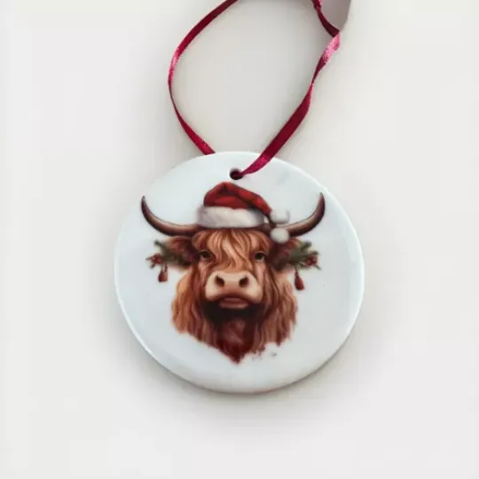 Discover Christmas bauble - Ceramic - Handmade and Gift boxed - Santa Highland Coo!