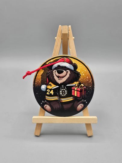 Happy Bear With A Christmas Present wearing a Boston Bruins Jersey Holiday Christmas Tree Ornament