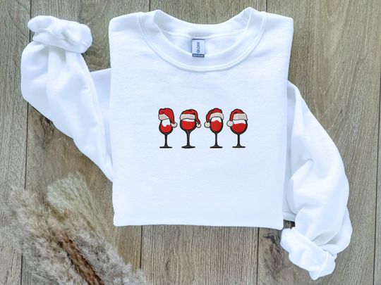 Discover EMBROIDERED| Christmas Wine Sweatshirt, Christmas Sweater, Gift for Wine Lovers, Holiday Sweaters, Ugly Christmas Sweater, Happy New Year