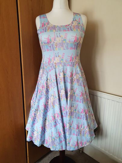 Small world windmill ride parks inspired print skater dress - plus size