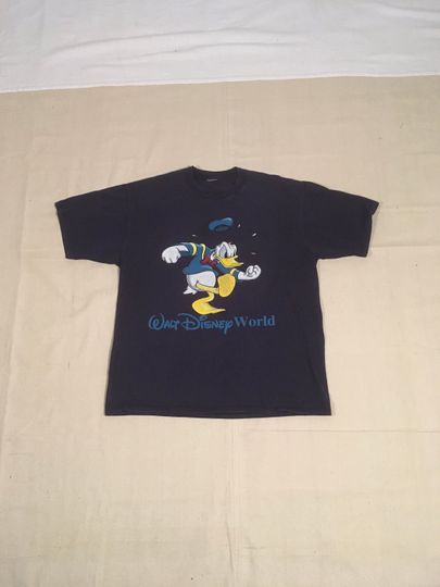 Discover Vintage 90s walt disney world donald duck T-shirt