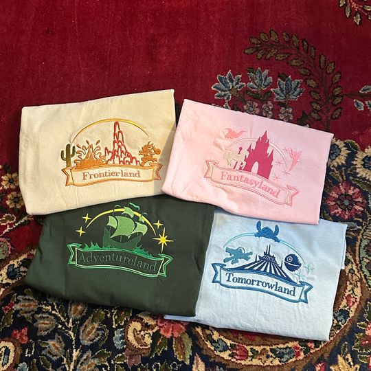 The Lands Embroidered Collection T-Shirts - Magic Kingdom Lands Embroidered T-Shirts - Disney Magic Kingdom Embroidered T-Shirts