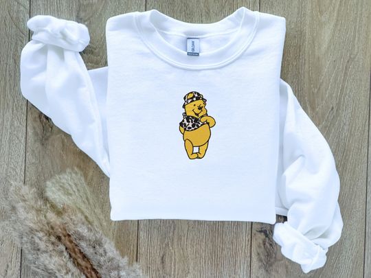 Discover EMBROIDERED Cow Print Winnie the Pooh Sweatshirt, Fall Theme Crewneck,  Sweatshirt, Fall Sweater, Halloween Sweatshirt, Western Theme