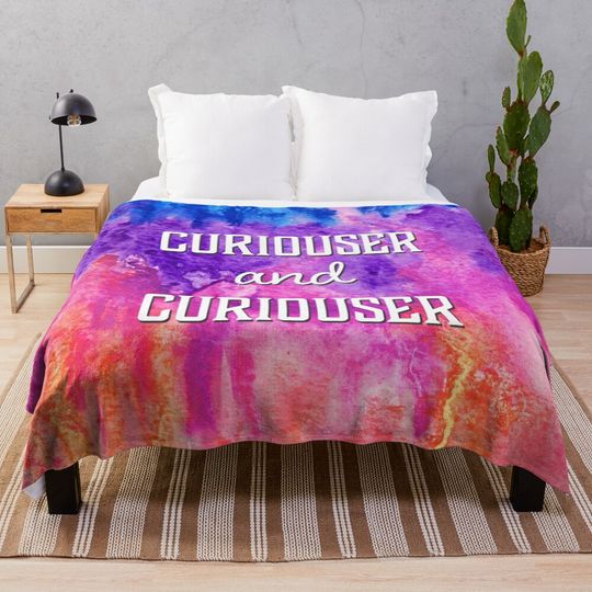 Curiouser and Curiouser Alice in Wonderland Quote over Rainbow Throw Blanket