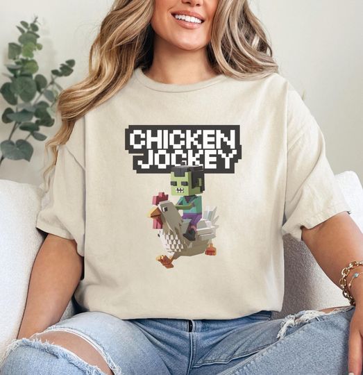 Discover Chicken Jockey Shirt, Hilarious Cotton Gamer Gift, Funny Farm Animal Tee, Perfect for Gamers & Animal Lovers, Minecraft Movie Shirt