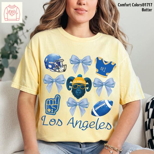 Discover Comfort Colors Los Angeles Coquette Bow Football Shirt - Playful design of Bows & Ram Tee, perfect for Los Angeles Game Day, Bow Tshirt