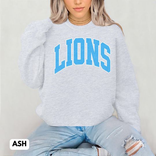 Distressed Detroit Lions Sweatshirt: Faded Blue Unisex Crewneck