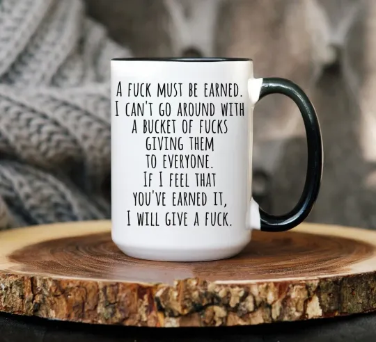 Discover A Fck Must Be Earned Coffee Mug