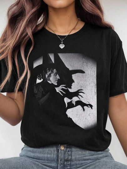 Discover Funny Wicked Shadow Vintage Halloween Graphic Tshirt, Oz Wizard Tee, Retro Witch Of West Shirt, Fan Gift, Matching Group Shirt, Unisex Top