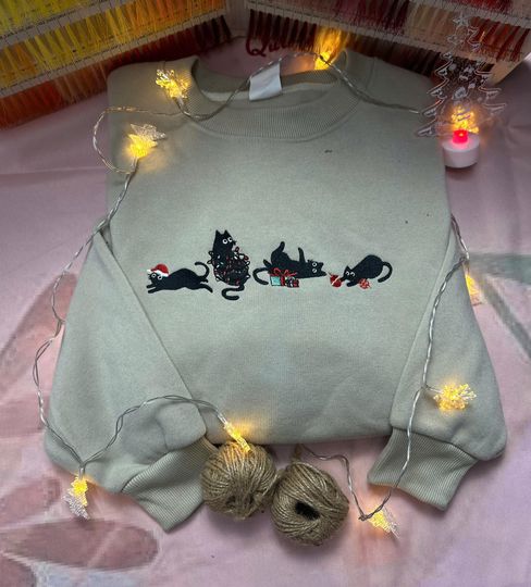 Discover Embroidered Christmas Cat Sweatshirt: Festive Holiday Jumper