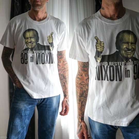 Discover Vintage 90s Richard Nixon White Single Stitch Distressed T-Shirt