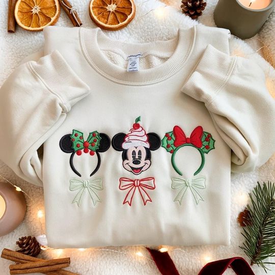 Discover EMBROIDERED Mickey Christmas Sweatshirt, Coquette Bow Disney Holiday Crewneck, Mickey Mouse Xmas Sweater, Disney Winter Shirt, Merry Xmas