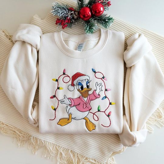 Discover Embroidered Daisy Very Merry Xmas Party Sweatshirt, Mickey and Friends Disney Christmas Lights Shirt, Family Matching Shirt, Christmas Gift