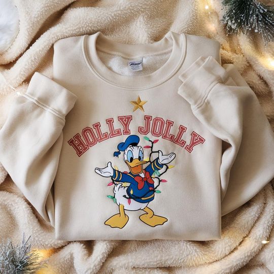 Discover EMBROIDERED Donald Duck Christmas Sweatshirt, Holly Jolly Sweatshirt, Disney Donald Duck Shirt, Christmas Family Trip Shirts