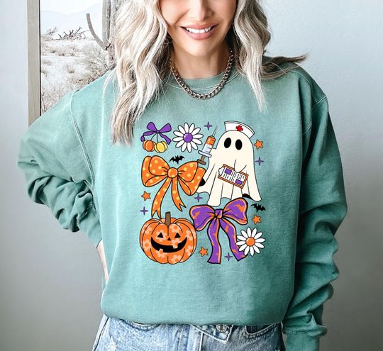Discover Comfort Colors Ghost Nurse Sweatshirt, Nurse Halloween Coquette Bow Sweatshirt, Nurse Halloween Gift, Spooky Nurse Hoodie, Nurse Sweatshirt
