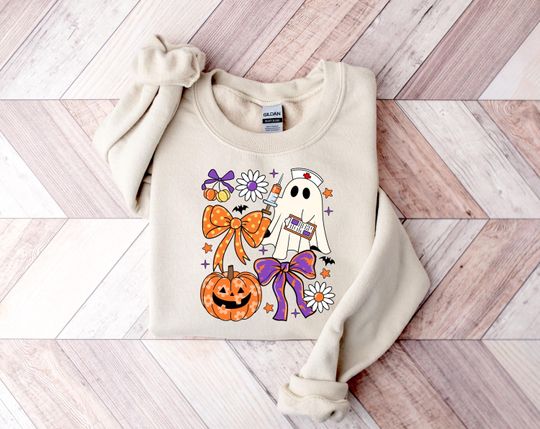 Discover Nurse Halloween Coquette Sweatshirt, Nurse Sweatshirt, Ghost Nurse Sweatshirt, Spooky Nurse Shirt, ER Nurse Sweatshirt, Nurse Halloween Gift