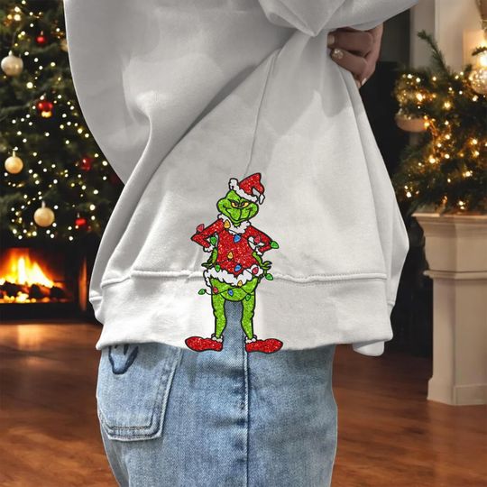 Discover Funny Green Guy Christmas Movie Side Bow Sweatshirt, Christmas Shirt, Women Christmas Outfit, Christmas Gift