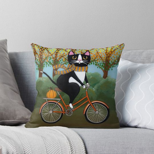 Discover Autumn Cat on a Bicycle  Pillow
