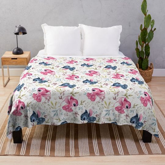 Discover Lilo And Stitch Tropical floral on white Throw Blanket