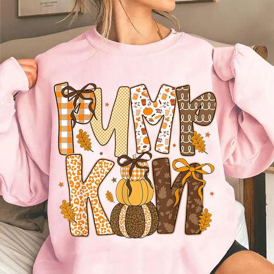 Discover Retro Halloween Coquette Sweatshirt with Pumpkin Checkered & Bow Graphics