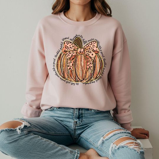 Discover Pumpkin Bow Hoodie: Cozy Fall Season Sweatshirt