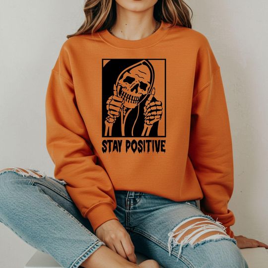 Discover Skull Stay Positive Sweatshirt: Halloween Horror Skeleton Hoodie