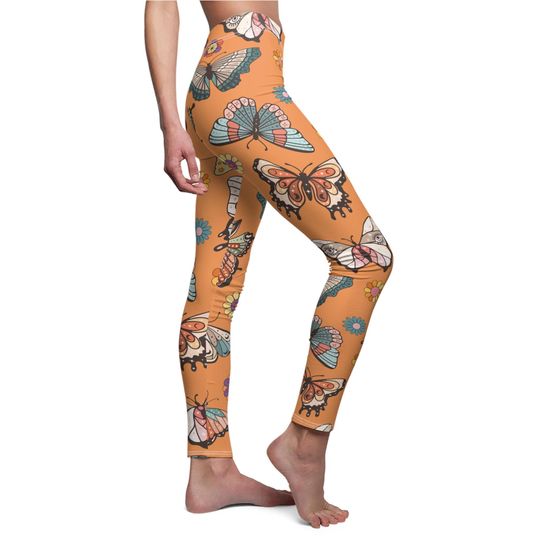 Discover Retro Groovy Butterfly Flower Leggings in Orange