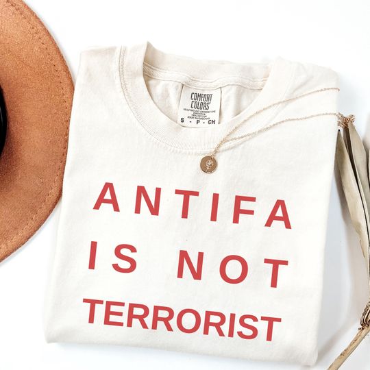 Discover ANTIFA Is Not Terrorist Shirt: Protest Activism Tee, Anti MAGA Political Shirt, Resist Democracy Apparel