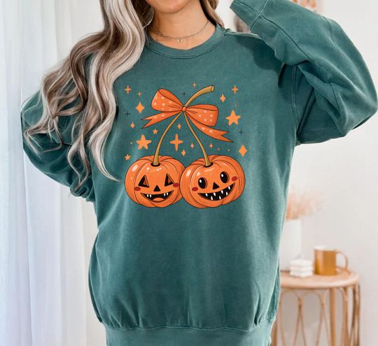 Discover Coquette Pumpkin Sweatshirt, Spooky Season, Pumpkin Cherries Sweatshirt, Halloween Pumpkin Sweatshirt